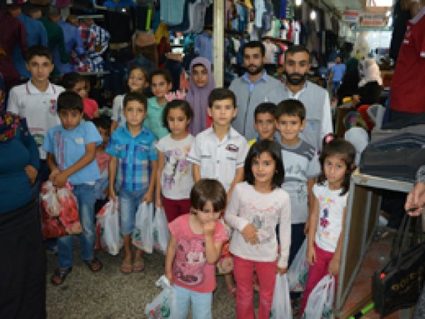 Batman’da IHO-EBRAR yetimleri giydirdi