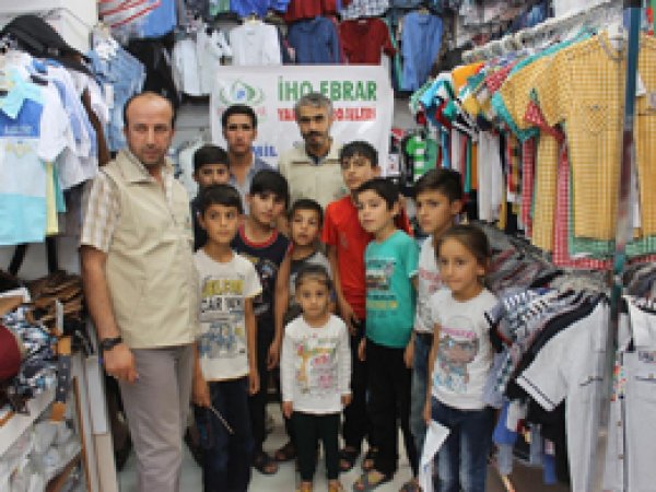 IHO-EBRAR'dan yetimlere giyim yardımı