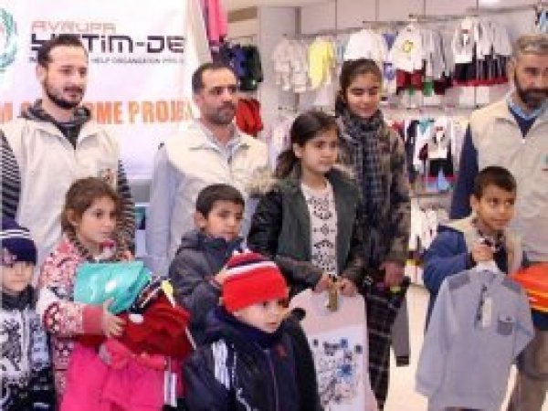 Avrupa Yetim-Der 60 yetimi giydirdi