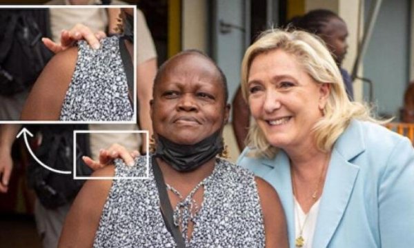  İslam düşmanı Fransız aday Marine Le Pen ırkçılığını böyle gösterdi: Siyah kadına tek parmağıyla dokundu