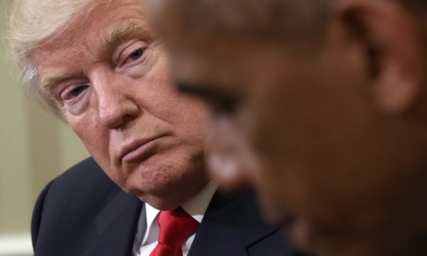 Epstein'in suç ortağı Trump'tan ırkçı paylaşım...Obama çiftini maymuna benzetti...